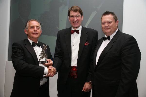 Endoline managing director and chairman Alan Yates receiving award